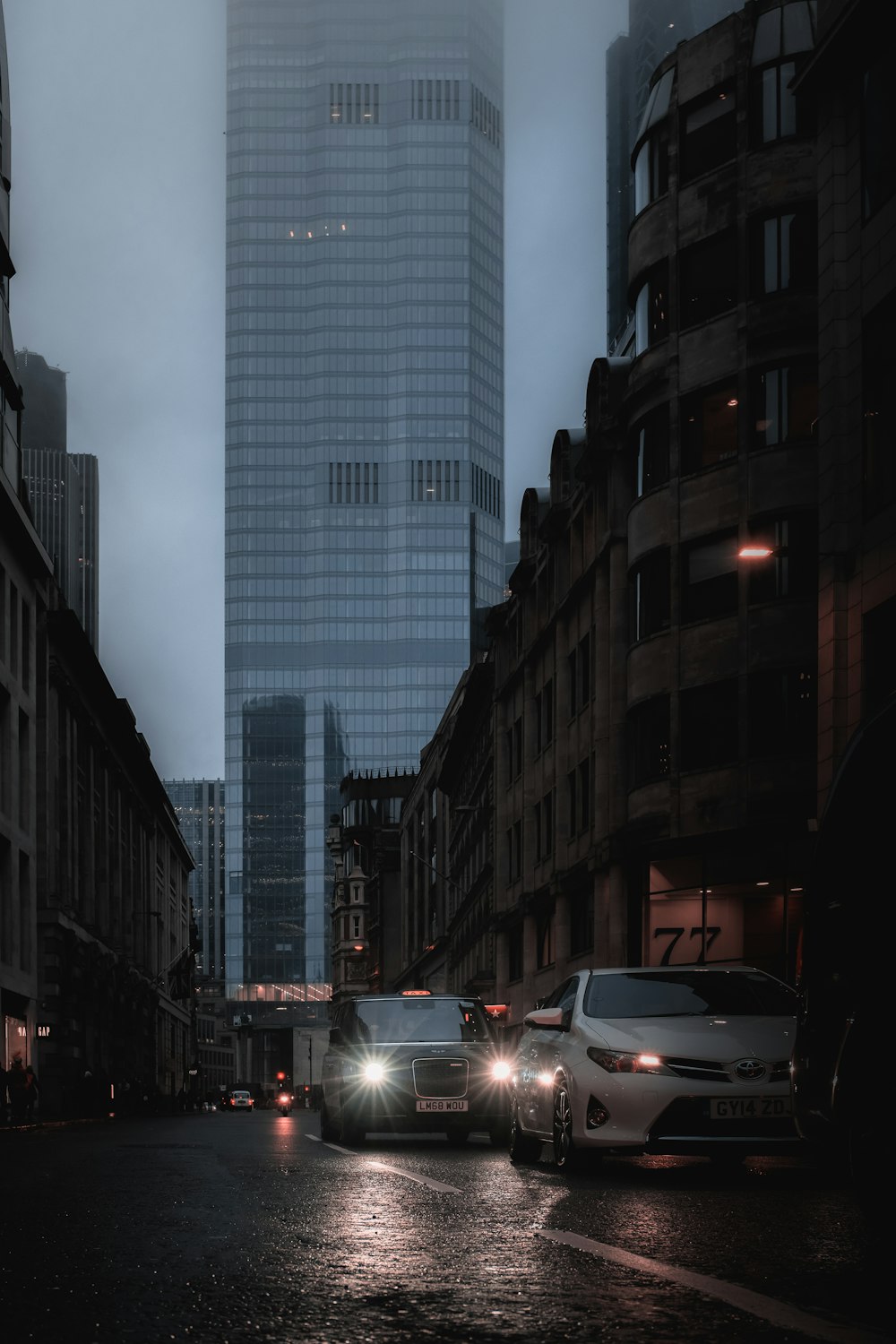 vehicles on road at night