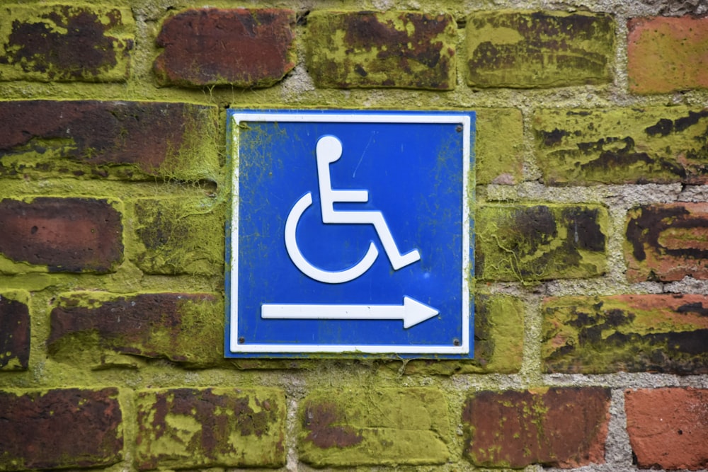 Accessibility compliance signage referencing UAE ramp code requirements