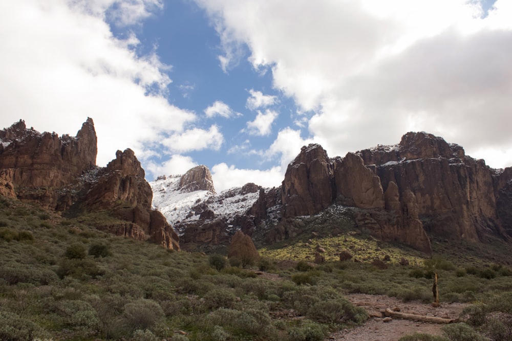 brown rocky mountain under blue sky during daytime