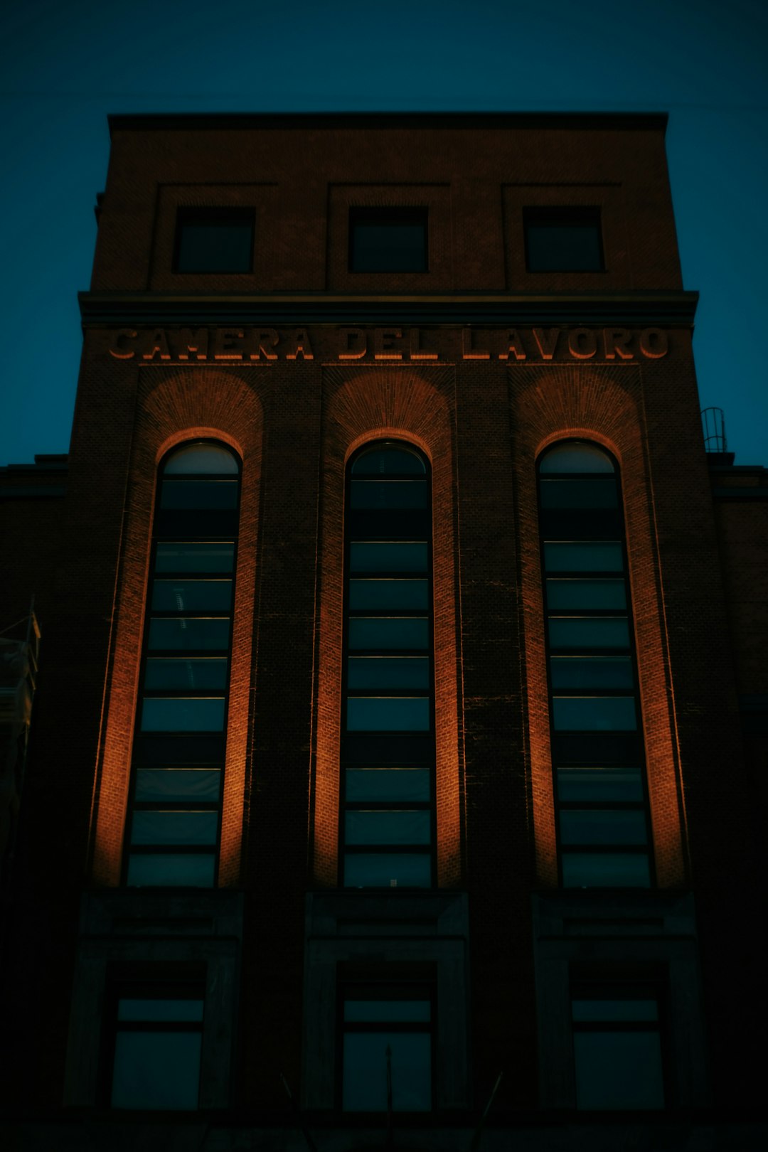 close-up photography of brown building during nighttime
