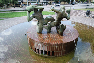 Ancient depiction of Ganymede, the mythological figure linked to Aquarius, offering water from a jug.