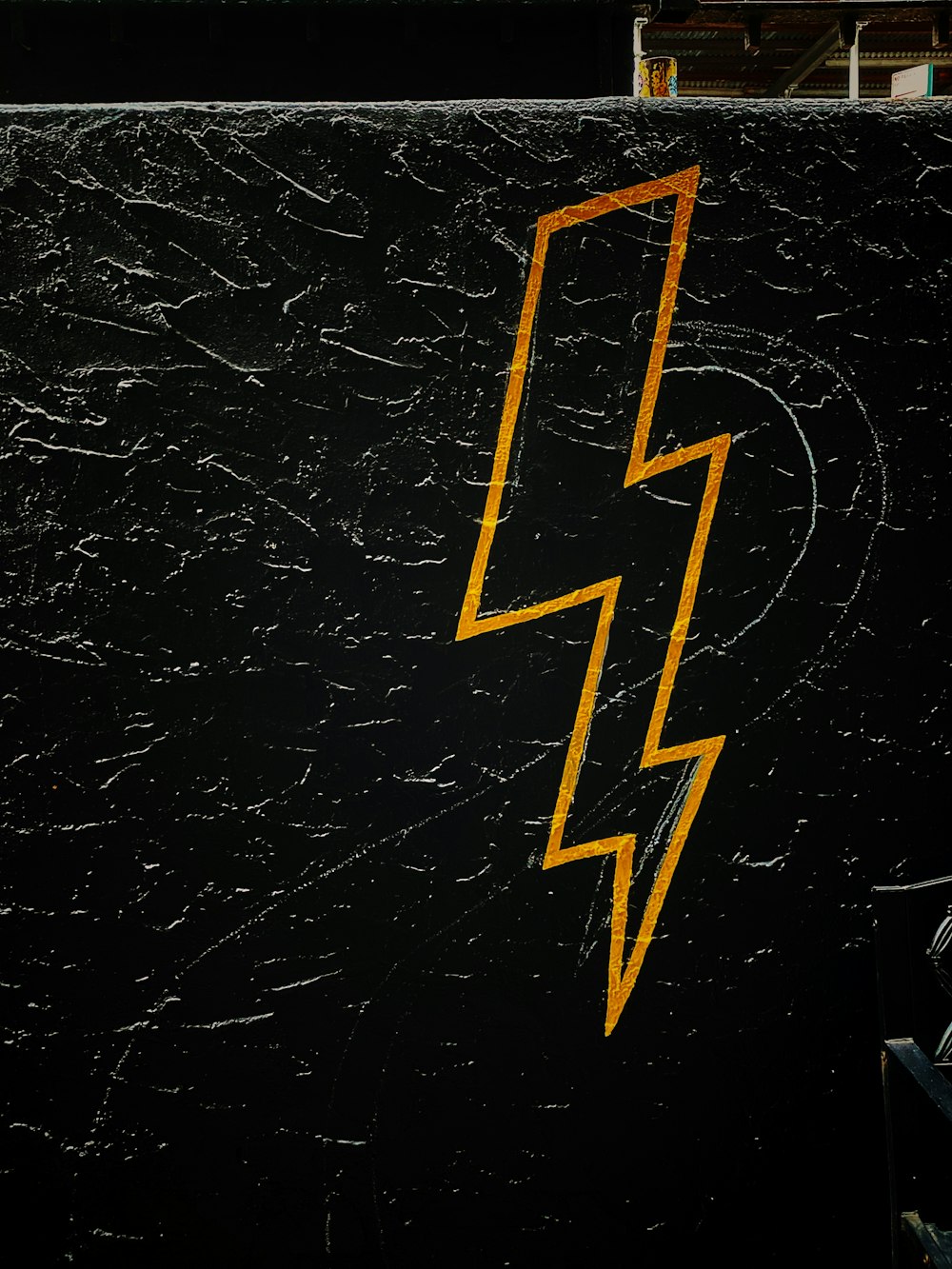 a picture of a lightning bolt painted on the side of a building