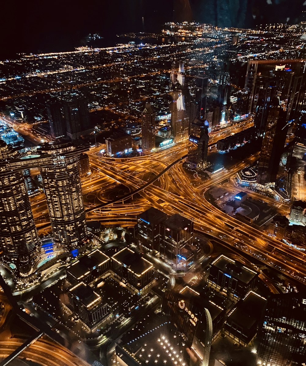 aerial view of lighted cityscape at night