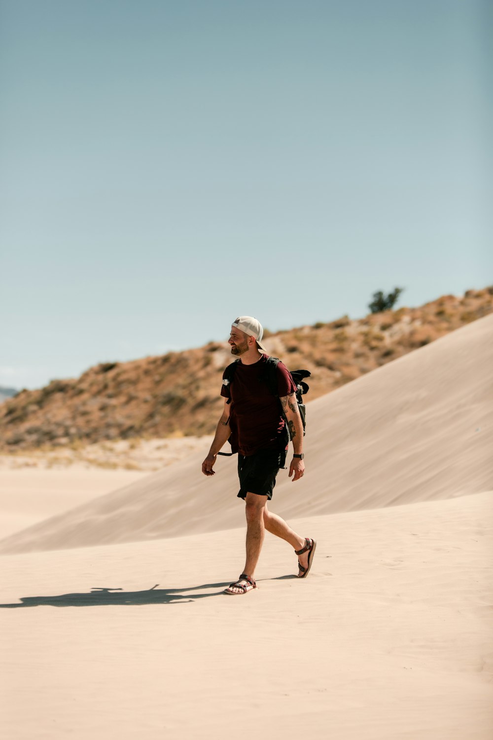 man standing on desert