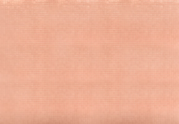 A grid pattern of peach-colored tiles creates a uniform surface, with each tile having a subtle glossy finish that reflects light.
