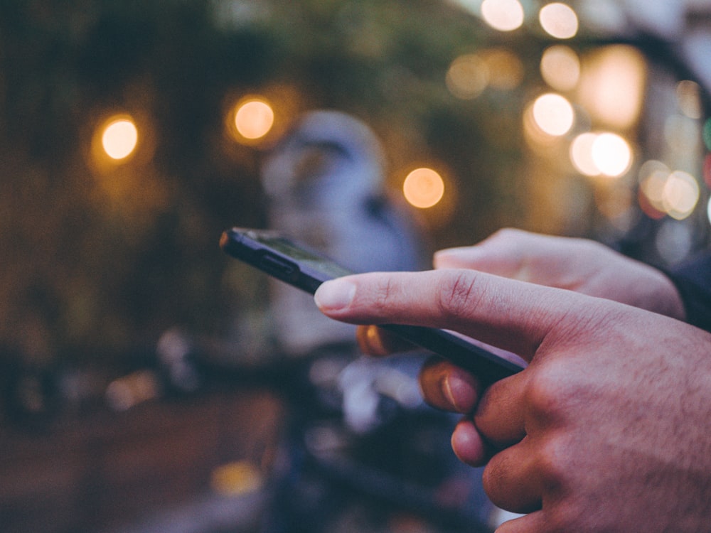 person holding smartphone