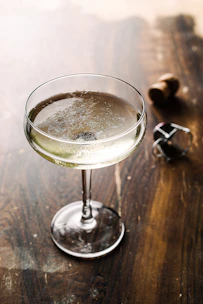 champagne filled glass cup