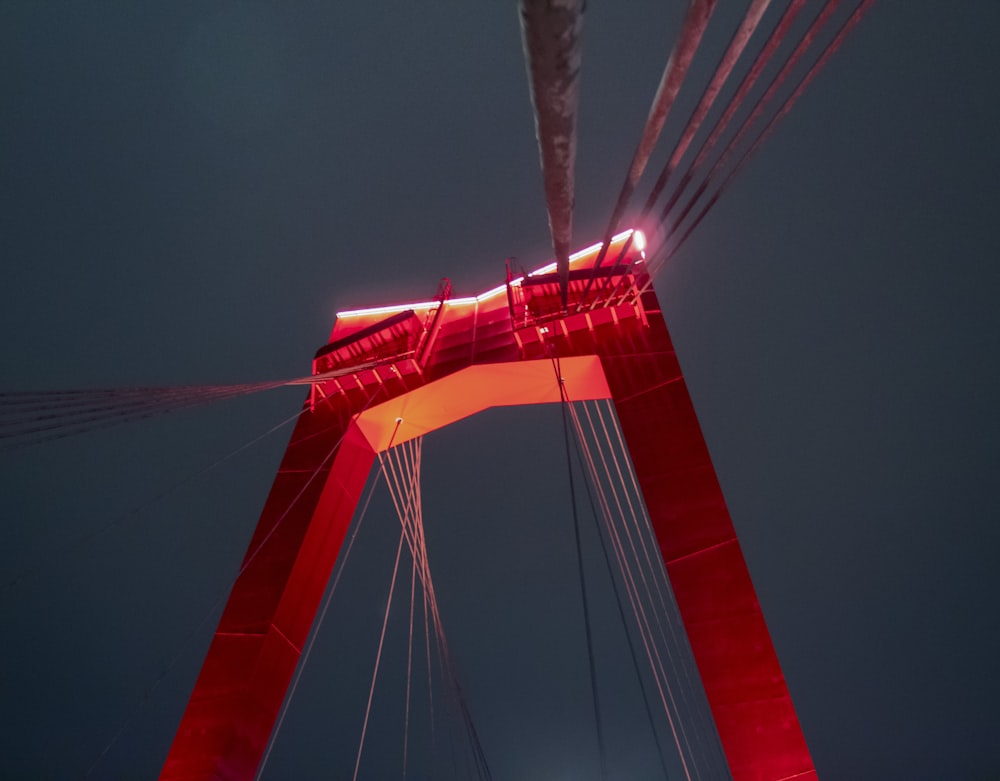 red cable-stayed bridge during night time