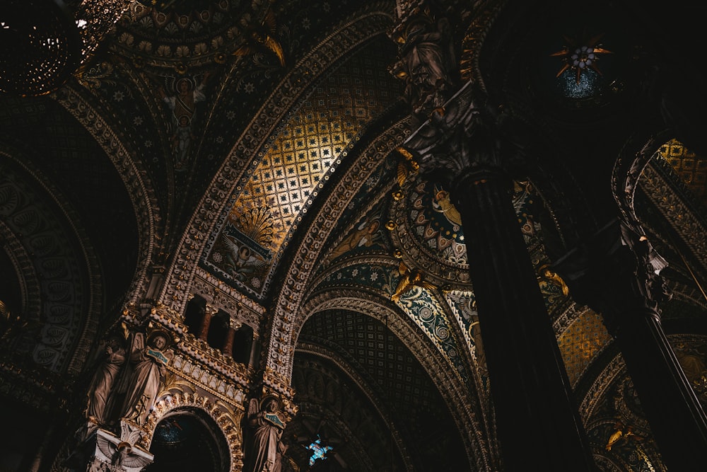 the ceiling of a church with intricate designs