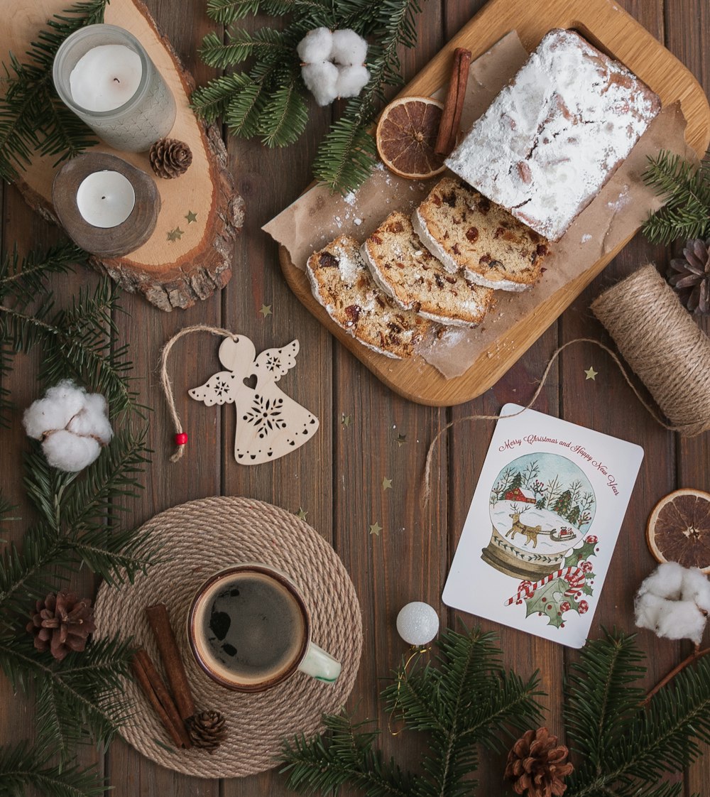 a table topped with a tray of food and a cup of coffee