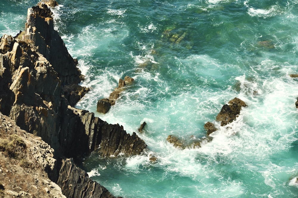 brown rocky seashore rock