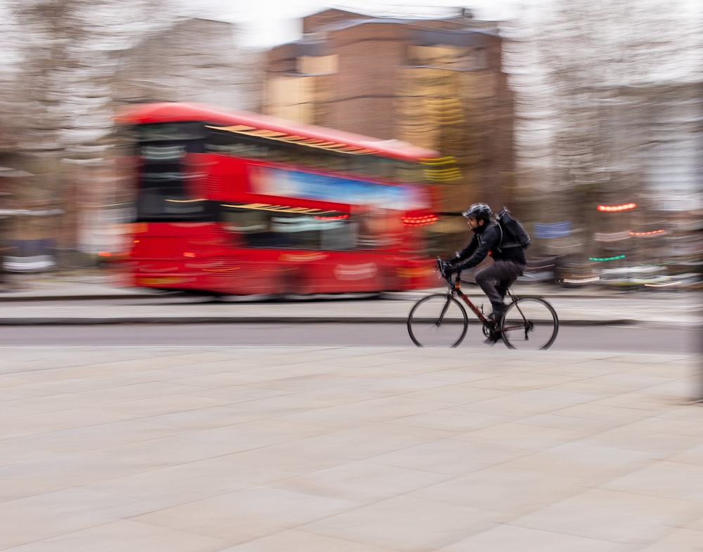 a blurry photo of a person riding a bike