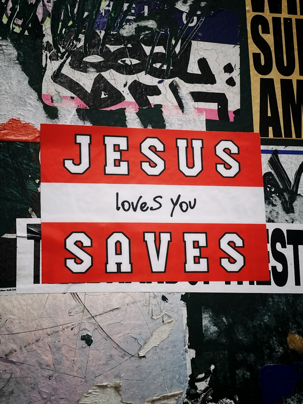 red and white Jesus Love You Saves artwork