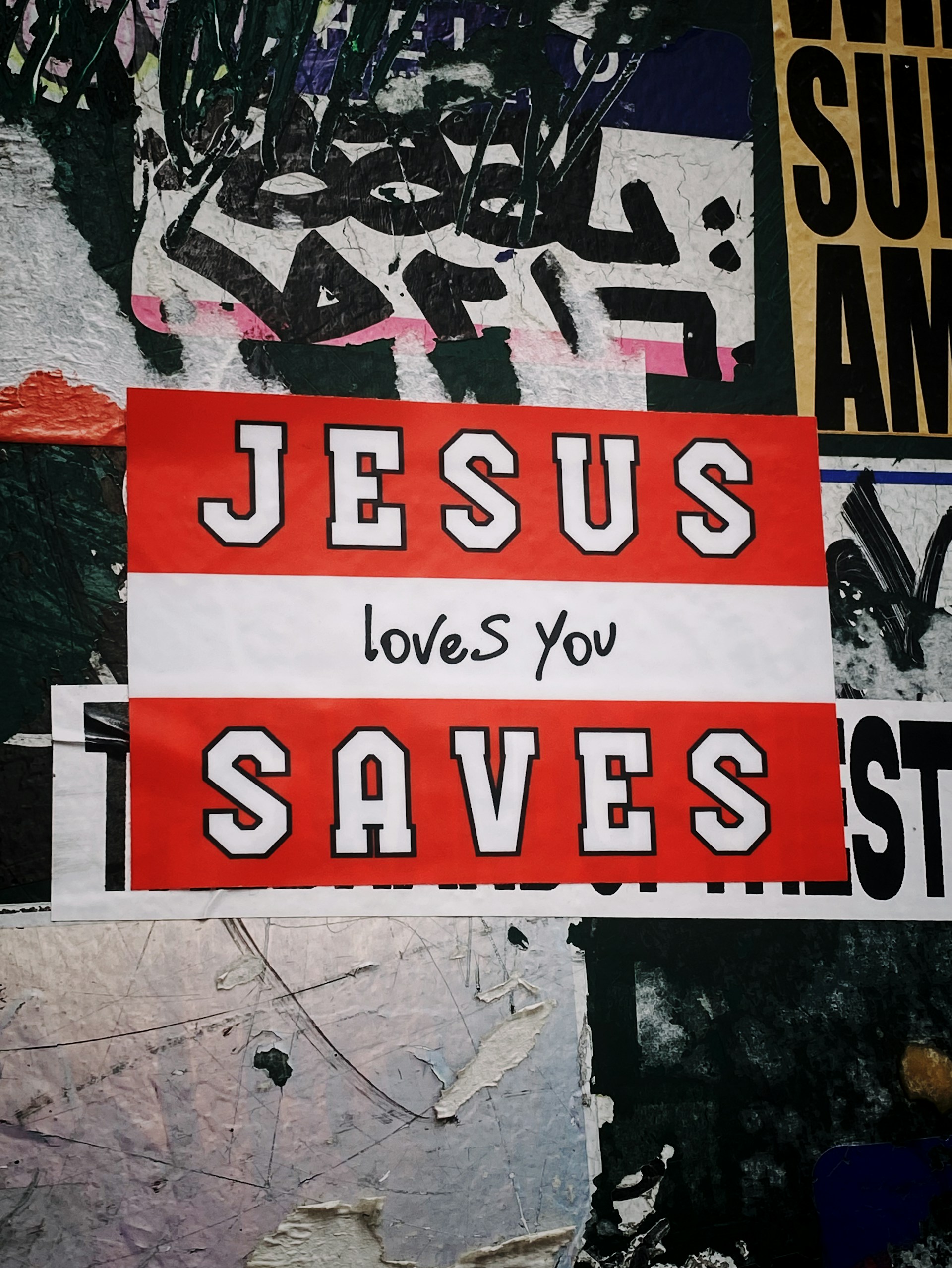 red and white Jesus Love You Saves artwork