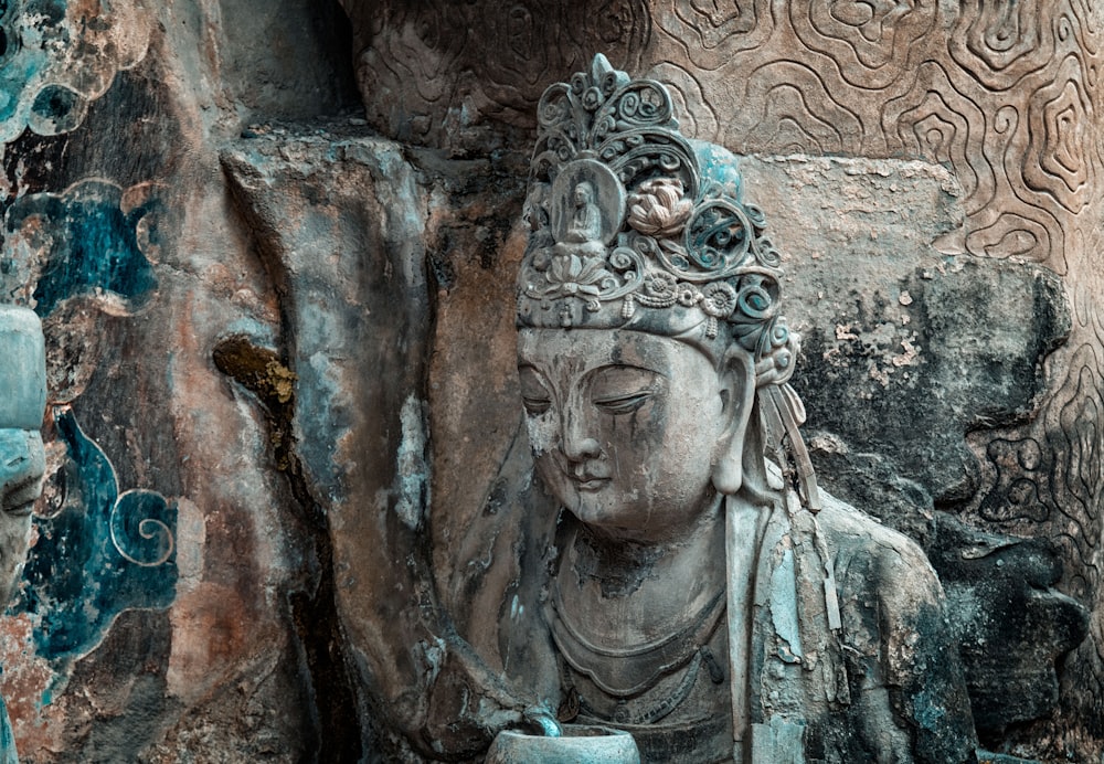 close-up photo of grey buddha statue