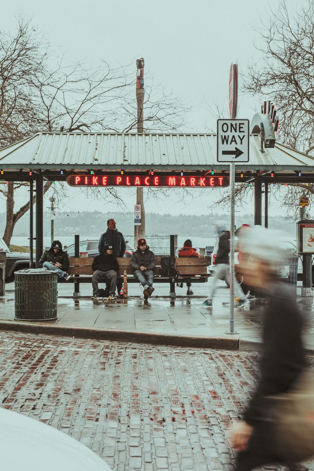 people sitting under shed during daytime