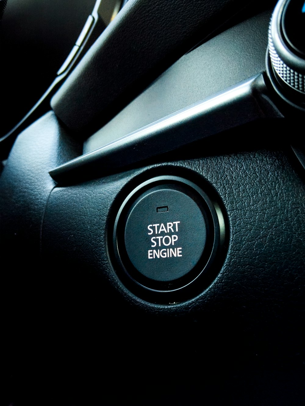 black start stop engine button