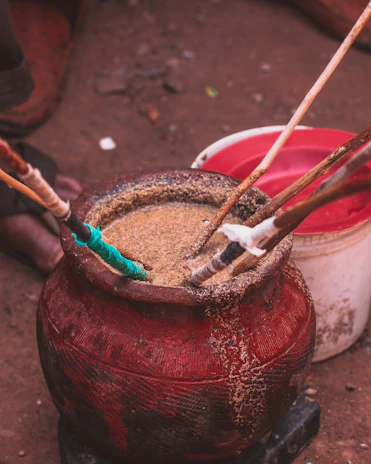 Close-up of hygienically packed cow dung powder containers ready for international shipment.