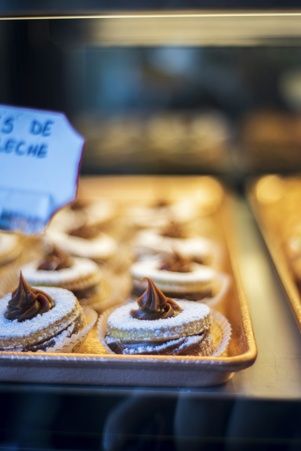 pastry on glass display with light