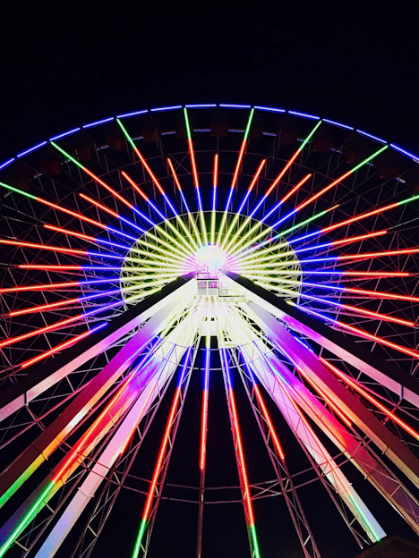 A vibrant golden wheel sparkling under bright lights, inviting users to spin and win prizes.
