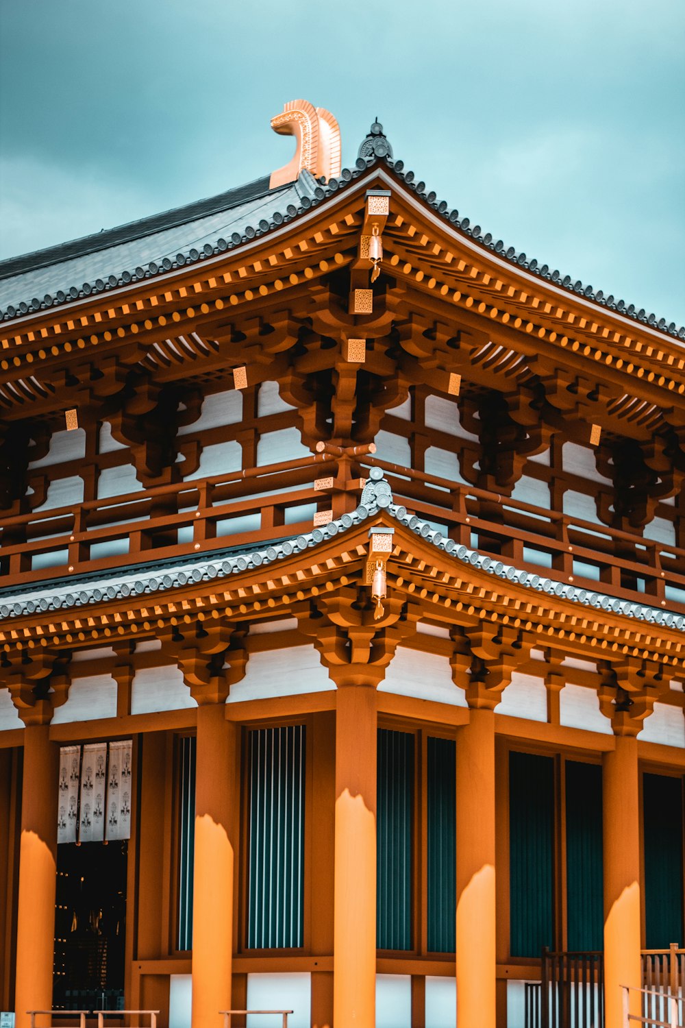 brown and white wooden temple during daytime