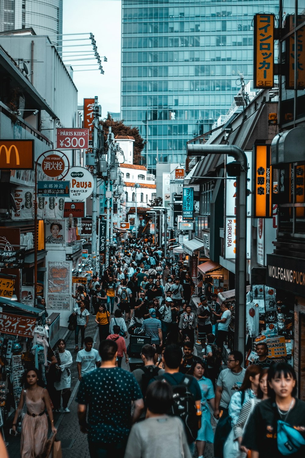 crowd walking on street during daytime
