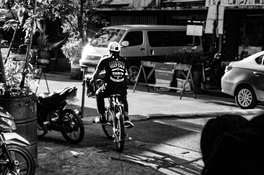 man driving the bicycle photograph