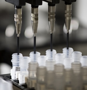 a group of plastic cups sitting on top of a machine