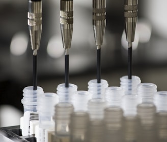 a group of plastic cups sitting on top of a machine