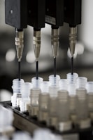 a group of plastic cups sitting on top of a machine