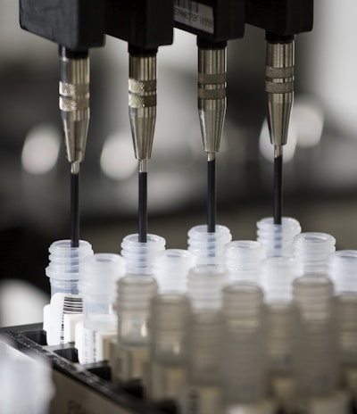 a group of plastic cups sitting on top of a machine