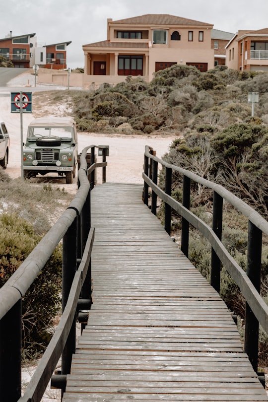 brown wooden bridge in Pearly Beach South Africa