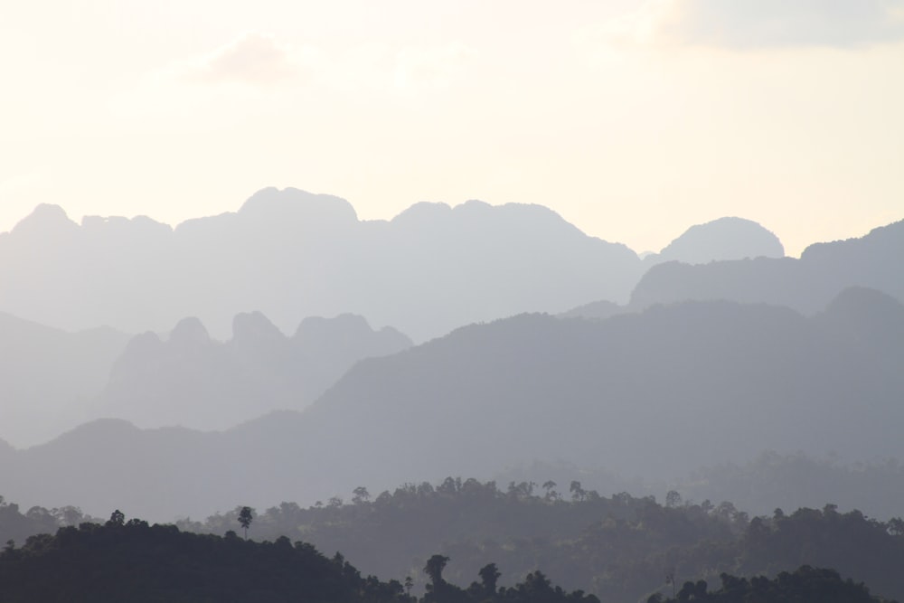 black mountain under cloudy sky