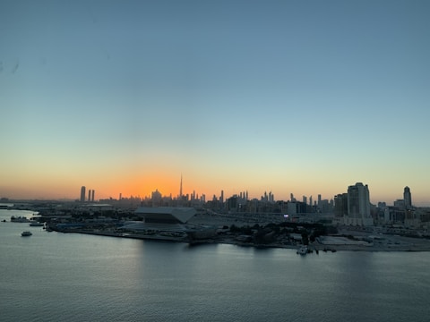 City skyline with new real estate developments at sunset.