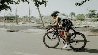 man riding bicycle on street