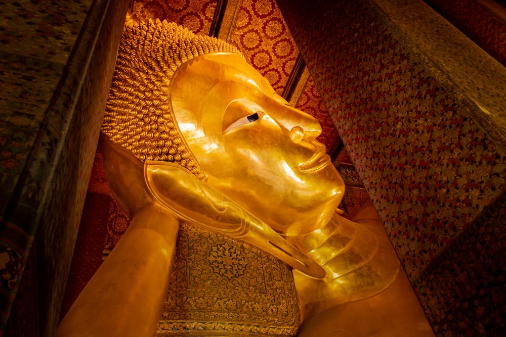 gold-colored buddha head