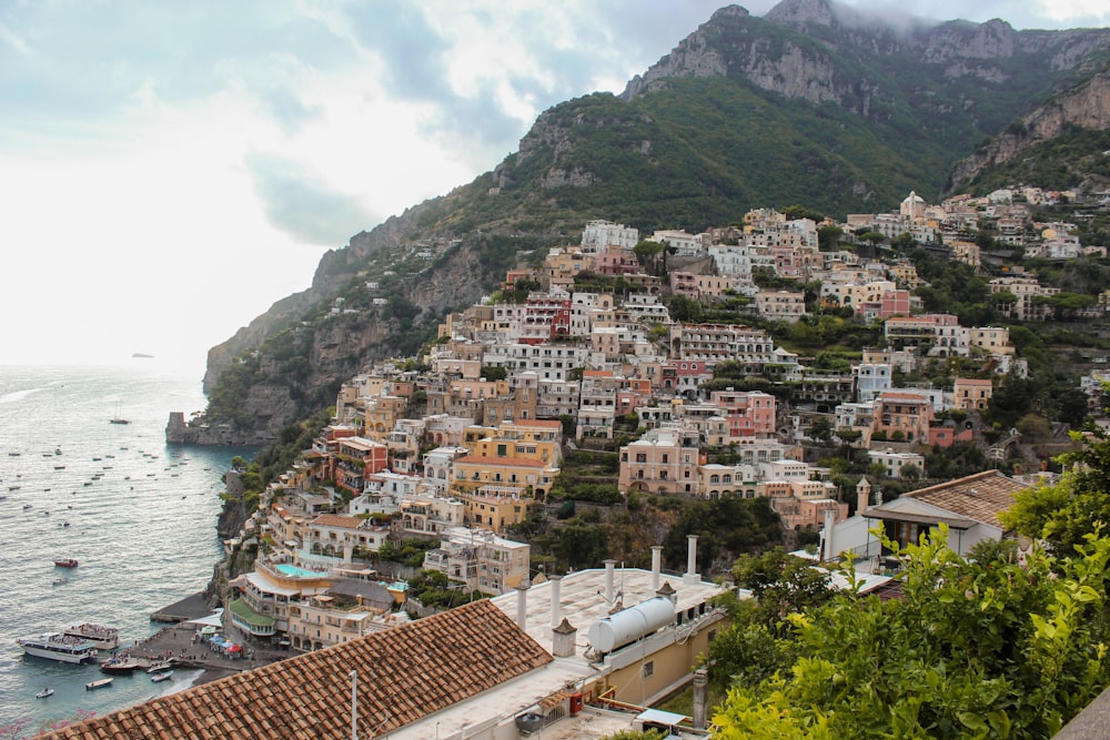 a view of a village on the side of a mountain