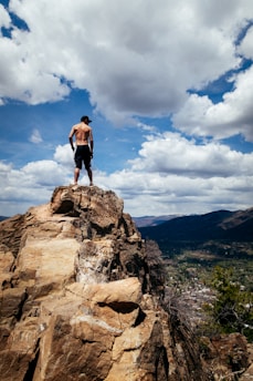 man standing on rocks