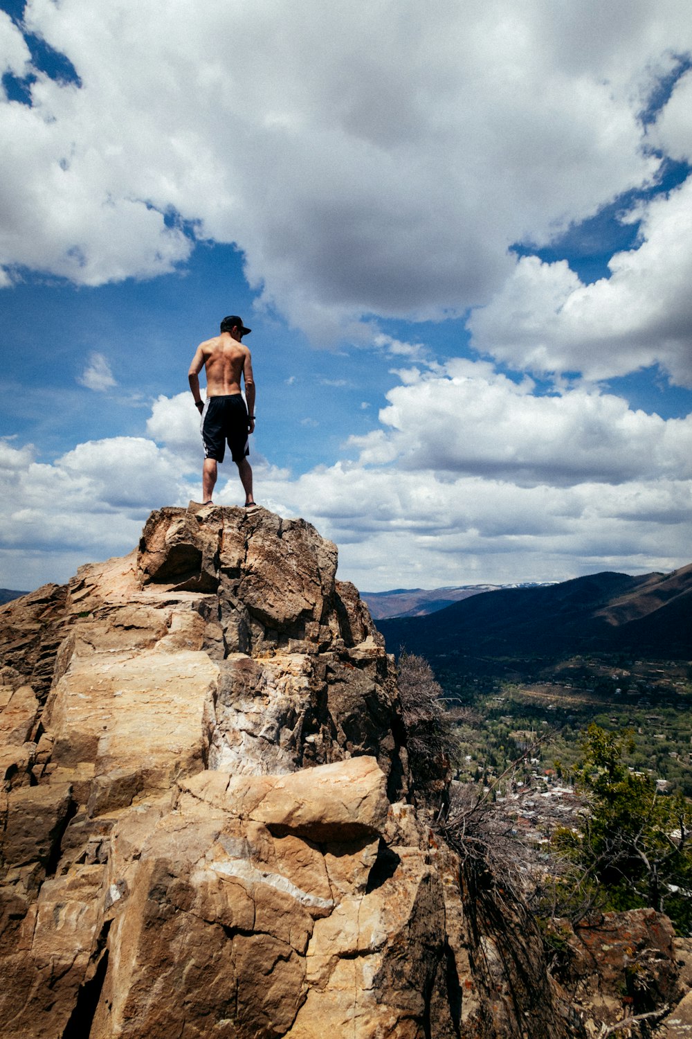 man standing on rocks