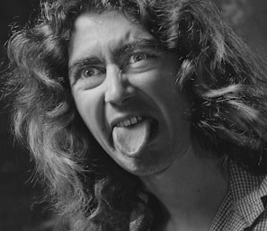 A playful moment captured of a woman making a funny face on camera
