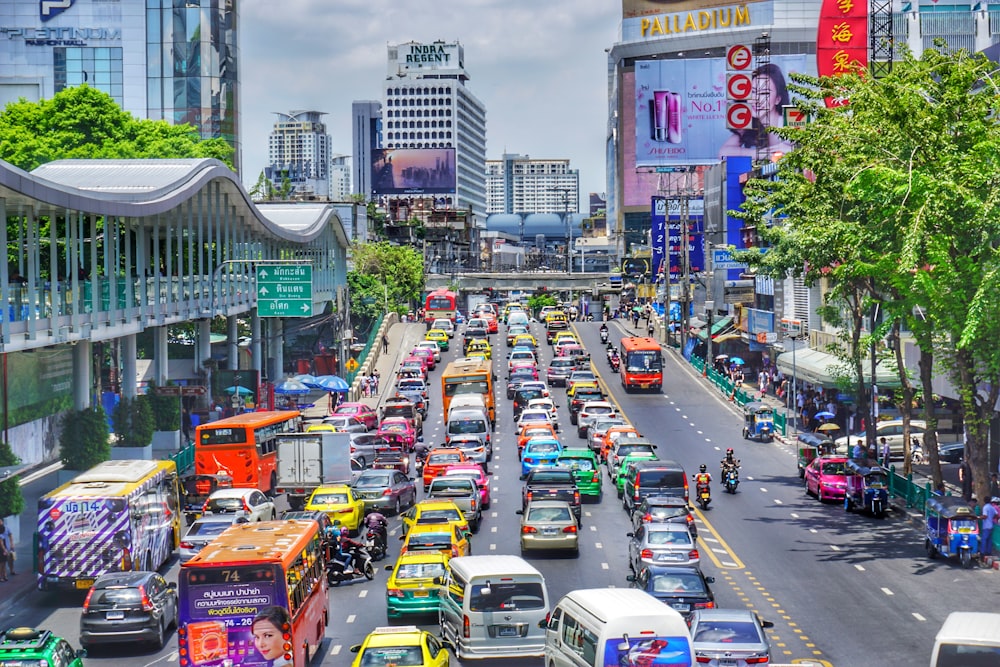 cars on road near buildings during daytime