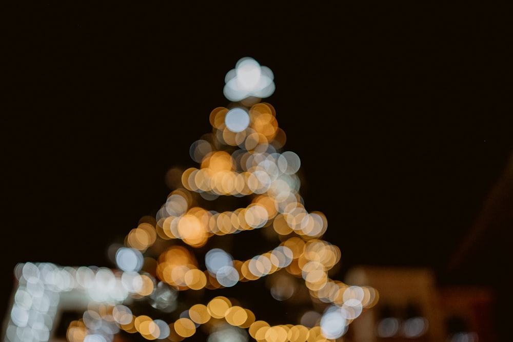 a blurry photo of a lit christmas tree