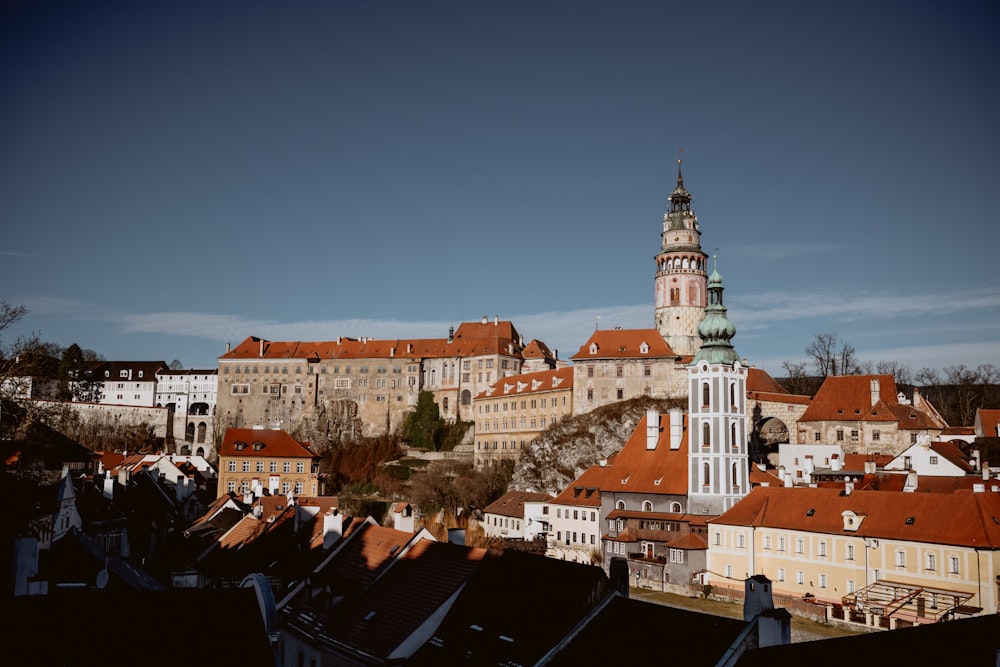 houses and buildings of Prague under blue and white sky