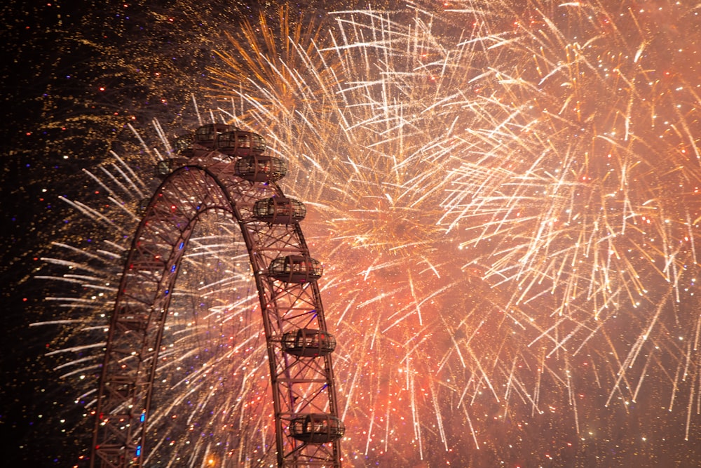 Ferris wheel and fireworks display