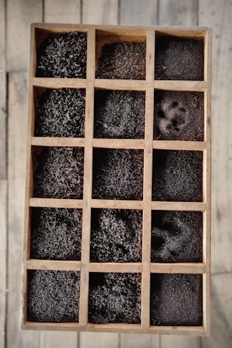 sands on brown wooden box