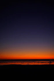 A stunning sunset over the ocean horizon.