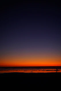 A stunning sunset over the ocean horizon.