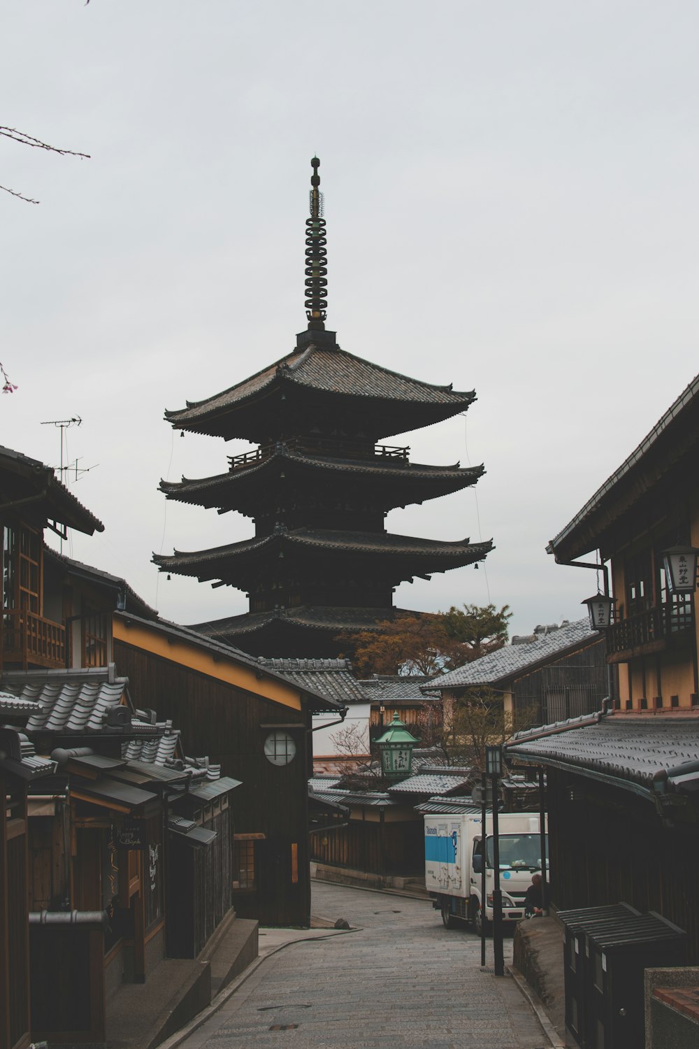 Yasaka Shrine in Japan near houses during daytime