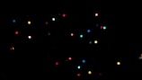 A collection of colorful party lights illuminating a dance floor.