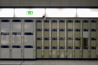 Rows of storage lockers with clear signage and well-lit corridors.